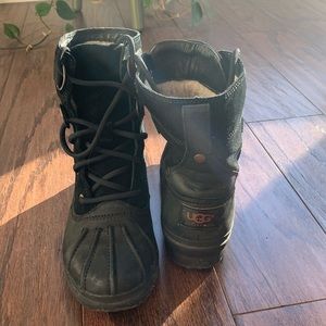 UGG Black waterproof, shearling winter boots. Size 6 Like new. Hardly worn